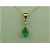 Image 1 : Very Fine 14K YG Ladies Handmade Pendant Set with a center pear shape fern green Emerald weighing ap