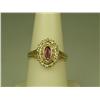 Image 1 : Dazzling 14K Yellow Gold Ladies Ring Set with a center red ruby and pave set with over 22 round diam