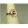 Image 2 : Dazzling 14K Yellow Gold Ladies Ring Set with a center red ruby and pave set with over 22 round diam