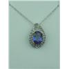 Image 1 : Elegant 10K White Gold Ladies Pendant Set with a center cobalt blue sapphire weighing 1.76 carats an