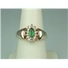 Image 1 : Dazzling 14K Yellow Gold Ladies Ring Set with a fine green emerald and 14 round diamonds with a tota