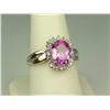 Image 2 : Brilliant 10K Yellow Gold Ladies Ring Set with a center pink topaz weighing approx. 3.00 carats and 