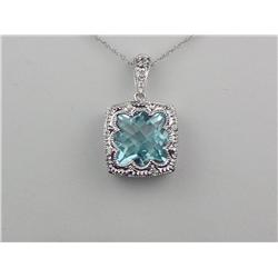 Exquisite 10K WG Ladies Custom Design Pendant Fine set with a custom cut sky blue topaz weighing ove