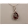 Image 1 : Pleasant 10K WG Ladies Handmade Necklace Set with a pear shape reddish/purple garnet weighing approx
