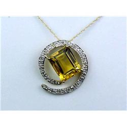 Pleasant 10K Yellow Gold Ladies Pendant Set with a center emerald cut Citrine weighing approx. 3.00 
