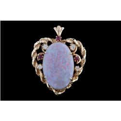 Ladies Heart Pendant w/Large Oval Opal Cab Surrounded by four diamonds and three garnets set in beau