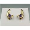 Image 1 : Stylish 14K YG Ladies Custom Design Earrings Set with 2 fine trilliant cut Tanzanite and 6 baguette 