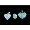 Image 1 : Collection of 3 Opals One loose crystal opal 2.77cts, and two heart shaped opal pendants.One loose c