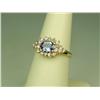 Image 2 : Dazzling 14K Yellow Gold Ladies Ring Set with a center oval Tanzanite weighing approx. 1.00 carat an