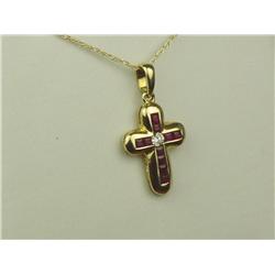Beautiful 14K Yellow Gold Ladies Cross Fine set with rubies and diamonds weighing approx. 0.50 carat