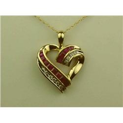 Ladies 10K YG Heart Design Pendant Pave and channel set with rubies and diamonds weighing approx. 0.