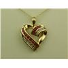 Image 1 : Ladies 10K YG Heart Design Pendant Pave and channel set with rubies and diamonds weighing approx. 0.