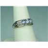 Image 1 : Elegant 10 White Gold Ladies Ring Set with 3 oval Tanzanites and side diamonds weighing approx. 0.60