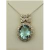 Image 1 : Dazzling 10K -2 Tone Gold Ladies Pendant Set with a large Sky blue topaz weighing approx. 6.00 carat