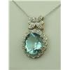 Image 2 : Dazzling 10K -2 Tone Gold Ladies Pendant Set with a large Sky blue topaz weighing approx. 6.00 carat