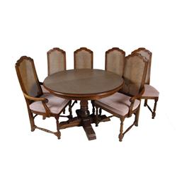 Walnut Round Dining Set Includes 2 leaves, table pads, and 6 matching chairs with cane backs and uph