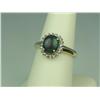 Image 2 : Pleasant 10K Yellow Gold Ladies Ring Set with a center Australian black Opal weighing approx 2.0 car