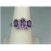 Image 1 : Dazzling 10K White Gold Ladies Ring Fine set with 3 matching oval Amethyst weighing approx. 2.00 car