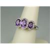 Image 2 : Dazzling 10K White Gold Ladies Ring Fine set with 3 matching oval Amethyst weighing approx. 2.00 car
