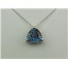 Image 1 : Quality 14K WG Ladies Custom Made Pendant Set with a trilliant cut London blue topaz weighing approx