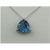 Image 2 : Quality 14K WG Ladies Custom Made Pendant Set with a trilliant cut London blue topaz weighing approx
