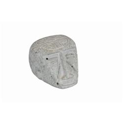 Mexican Carved Green Stone Head Has several minor hairline cracks.Has several minor hairline cracks.