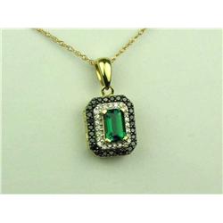 Irresistible 14K Yellow Gold Ladies Necklace Set with a center fine created emerald weighing over 0.