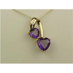 Ladies 14K YG Custom Made Pendant Set with 2 fine heart shape Amethyst weighing approx. 2.00 carats 