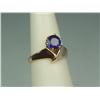 Image 1 : Pleasant 14K YG Ladies Freeform Design Ring Set with a fine round cobalt blue sapphire weighing 1.28