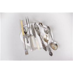 Interesting Bonanza Lot Consisting of 3 sterling spoons, a butter knife, sterling handled meat fork,