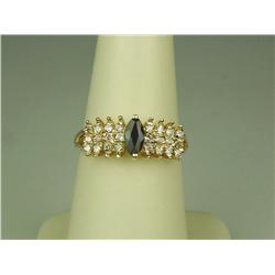 Dazzling 14K Yellow Gold Ladies Ring Set with a center MQ cut sapphire and 24 round cut diamonds wit