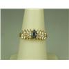 Image 1 : Dazzling 14K Yellow Gold Ladies Ring Set with a center MQ cut sapphire and 24 round cut diamonds wit