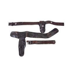 Lot of Leather Ammo Belts and Holsters Consists of 3 ammo belts, 2 with matching holsters. 2 belts s