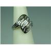 Image 2 : Brilliant 10K YG Ladies Swirl Design Ring Channel set with over 30 baguette and round diamonds weigh
