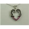 Image 2 : Attractive 14K WG Ladies Heart Design Pendant Fine set with over 20 round sapphires, rubies, and dia