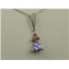 Image 2 : Ladies 14K WG Custom Design Pendant Set with a center trilliant cut Tanzanite weighing approx. 1.00 