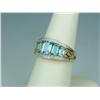 Image 2 : Dazzling 14K Yellow Gold Ladies Ring Fine set with 5 graduating emerald cut blue topaz weighing appr