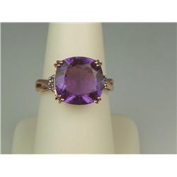 Rose Gold 10K Ladies Custom Made Ring Set with a large purple Amethyst weighing approx. 6.00 carats 
