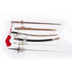 Collection of 4 Reproduction Swords Often used for reenactments or plays.Often used for reenactments