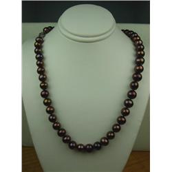 Ladies Strand of Chocolate Color Pearls Averaging 7.00mm in diameter. Retail: $999.00Averaging 7.00m