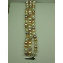 Ladies 3 Strand Freshwater Pearl Bracelet Multi-colored, averaging 7.50mm in diameter. Retail: $995.