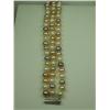 Image 1 : Ladies 3 Strand Freshwater Pearl Bracelet Multi-colored, averaging 7.50mm in diameter. Retail: $995.