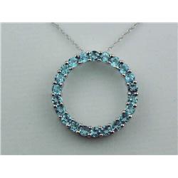 Ladies 10K WG "Circle of Life" Pendant Set with 22 round blue topaz weighing approx. 2.00 carats. Re