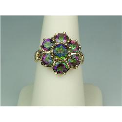Dazzling 10K Yellow Gold Ladies Ring Set with 7 round mystic topaz weighing approx. 3.00 carats. Ret