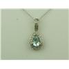 Image 1 : Elegant 10K Yellow Gold Ladies Pendant Set with a center sky blue topaz weighing over 1.00 carat and