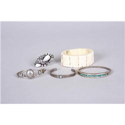 Collection of Jewelry Including a bone bracelet, three cuff bracelets, and a Native American sterlin