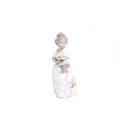 Zaphir Porcelain Figurine of an Asian Girl In overall good condition with minor loss to one finger.I