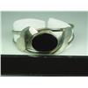 Image 1 : Elegant Ladies Sterling Silver Bangle Bracelet With bezel set onyx.With bezel set onyx.