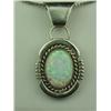Image 1 : Ladies Handmade Sterling Silver Pendant Set with a fine play of color bezel set opal.Set with a fine