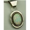 Image 2 : Ladies Handmade Sterling Silver Pendant Set with a fine play of color bezel set opal.Set with a fine